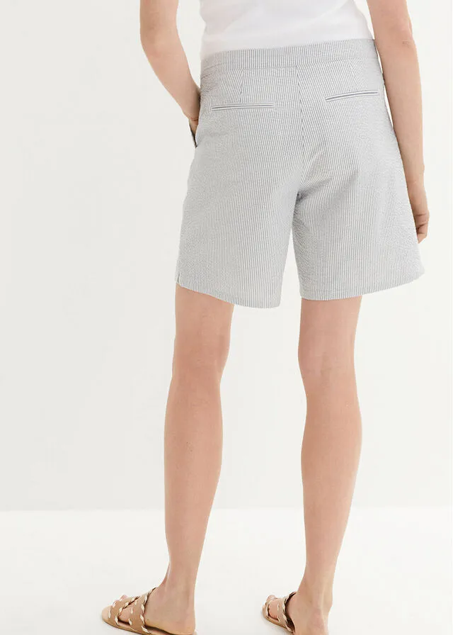 PANTALóN CORTO DE MIL RAYAS CON PLIEGUES Y CINTURA AJUSTABLE DENIMBLANCO LANA DE RAYAS