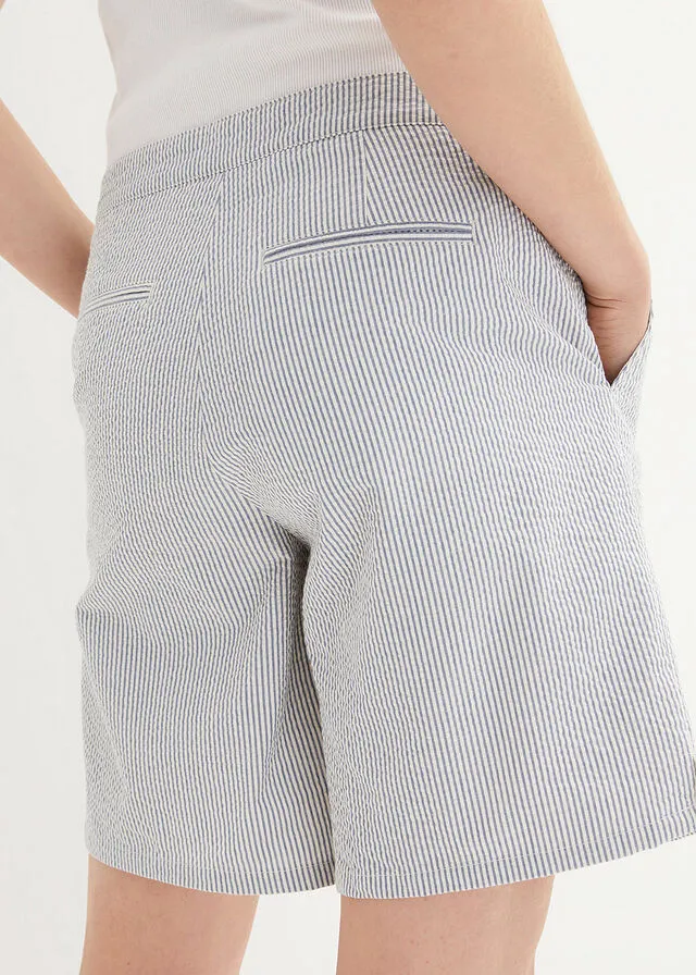 PANTALóN CORTO DE MIL RAYAS CON PLIEGUES Y CINTURA AJUSTABLE DENIMBLANCO LANA DE RAYAS