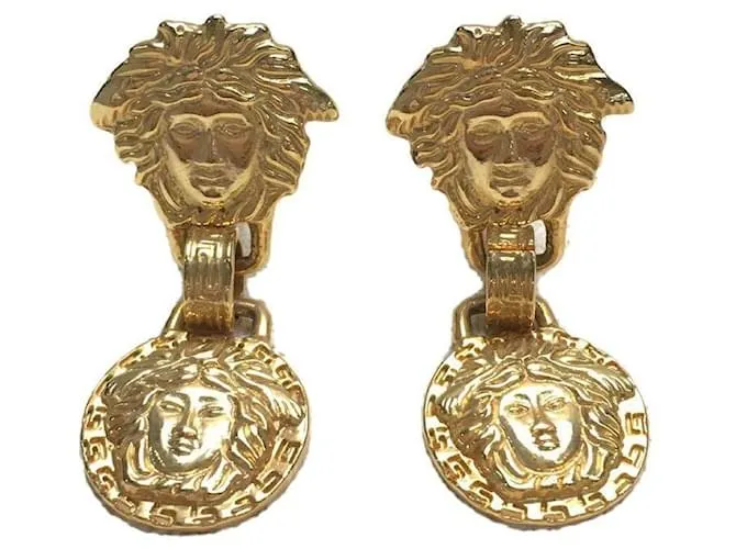 *Pendientes de oro de Gianni Versace Gold hardware 