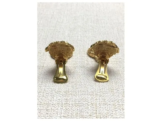 *Pendientes de oro de Gianni Versace Gold hardware 