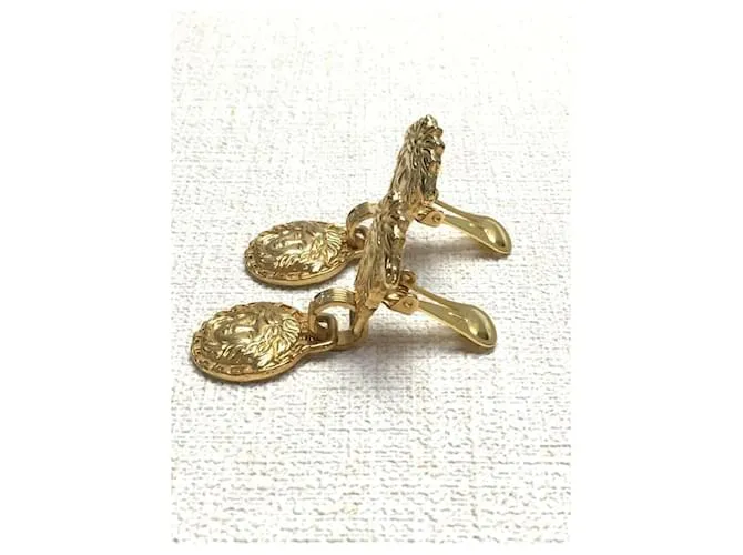 *Pendientes de oro de Gianni Versace Gold hardware 