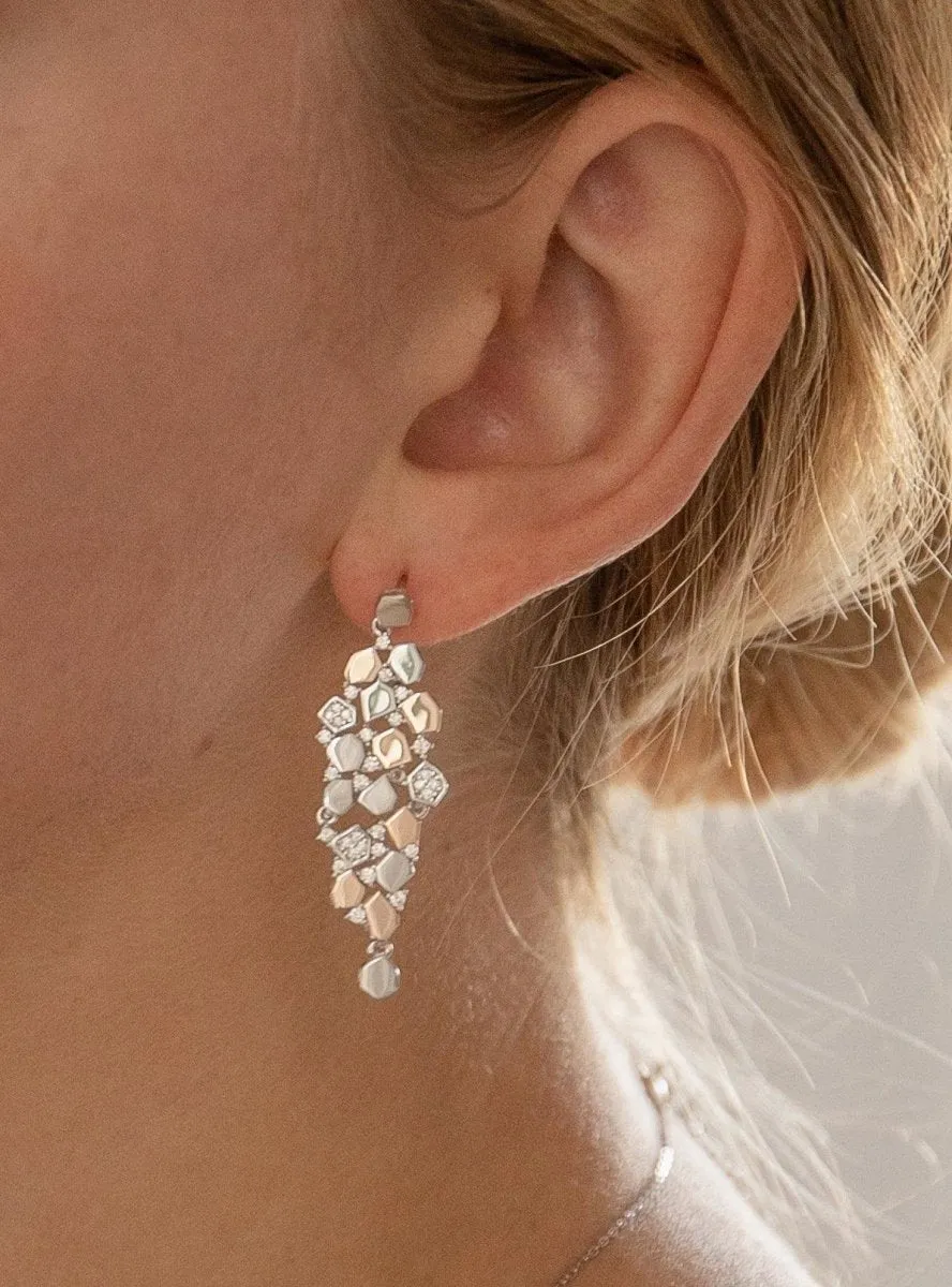 Pendientes largos diseo multipiezas bicolores y circonitas