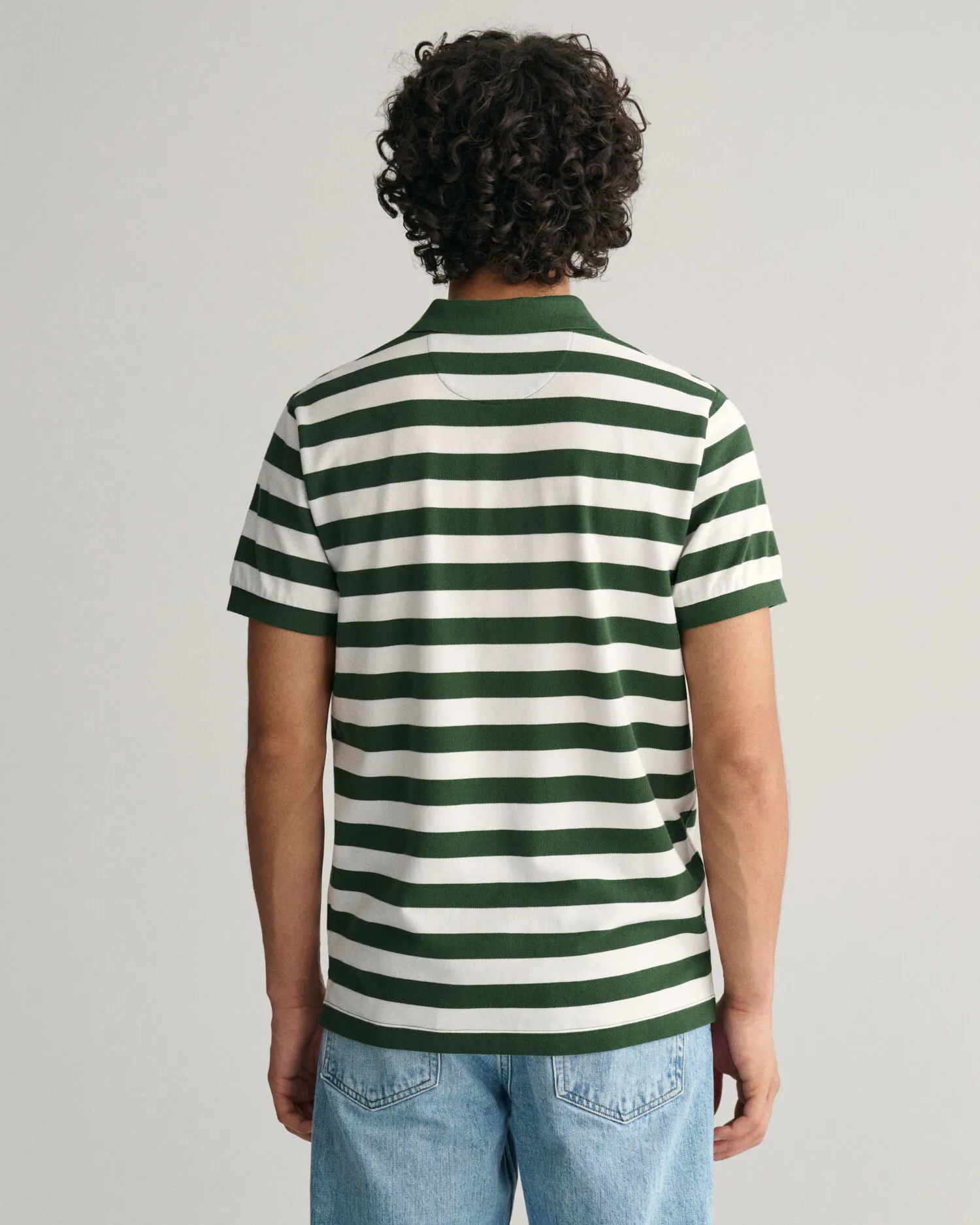 Polo de piqué a rayas anchas